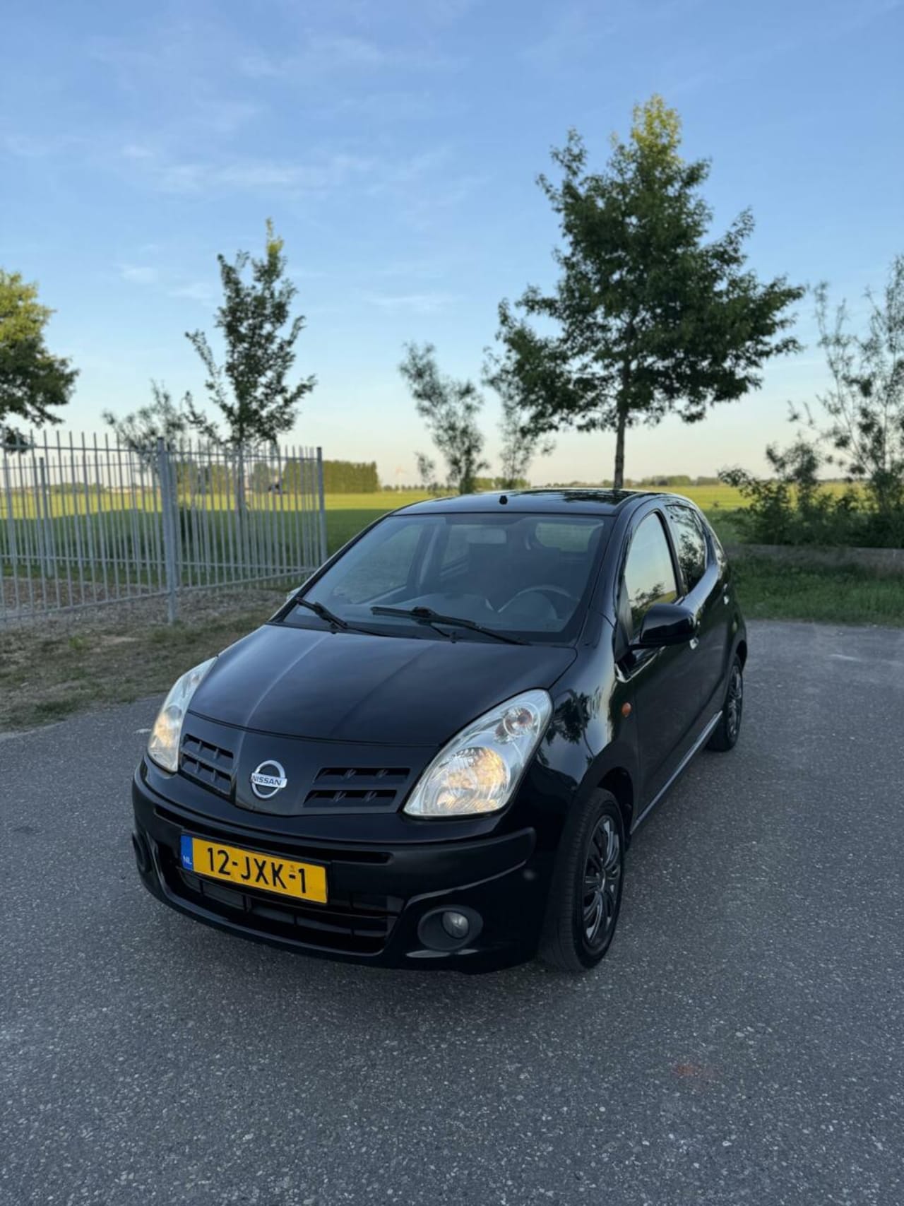 Nissan Pixo - 1.0 5-deurs Zwart Airco Dealer onderhouden - AutoWereld.nl
