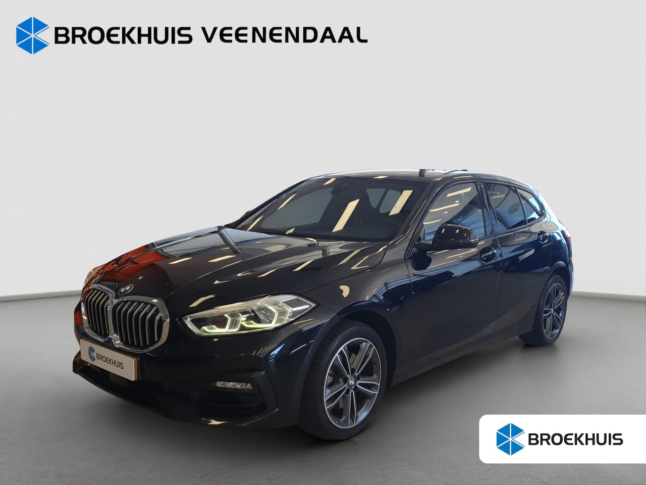 BMW 1-serie - 118i Executive Edition | Cruise Control | Apple Carplay | Navigatie - AutoWereld.nl