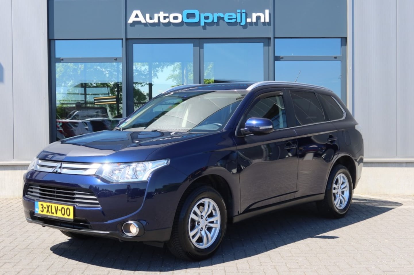 Mitsubishi Outlander - 2.0 Business Edition 7 personen AUTOMAAT NAVI Camera, trekhaak, - AutoWereld.nl