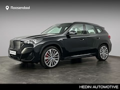BMW iX1 - xDrive30 67 kWh M-Sport Pro | Stoelmassage | Trekhaak | Harman Kardon | Park Assistance Pl