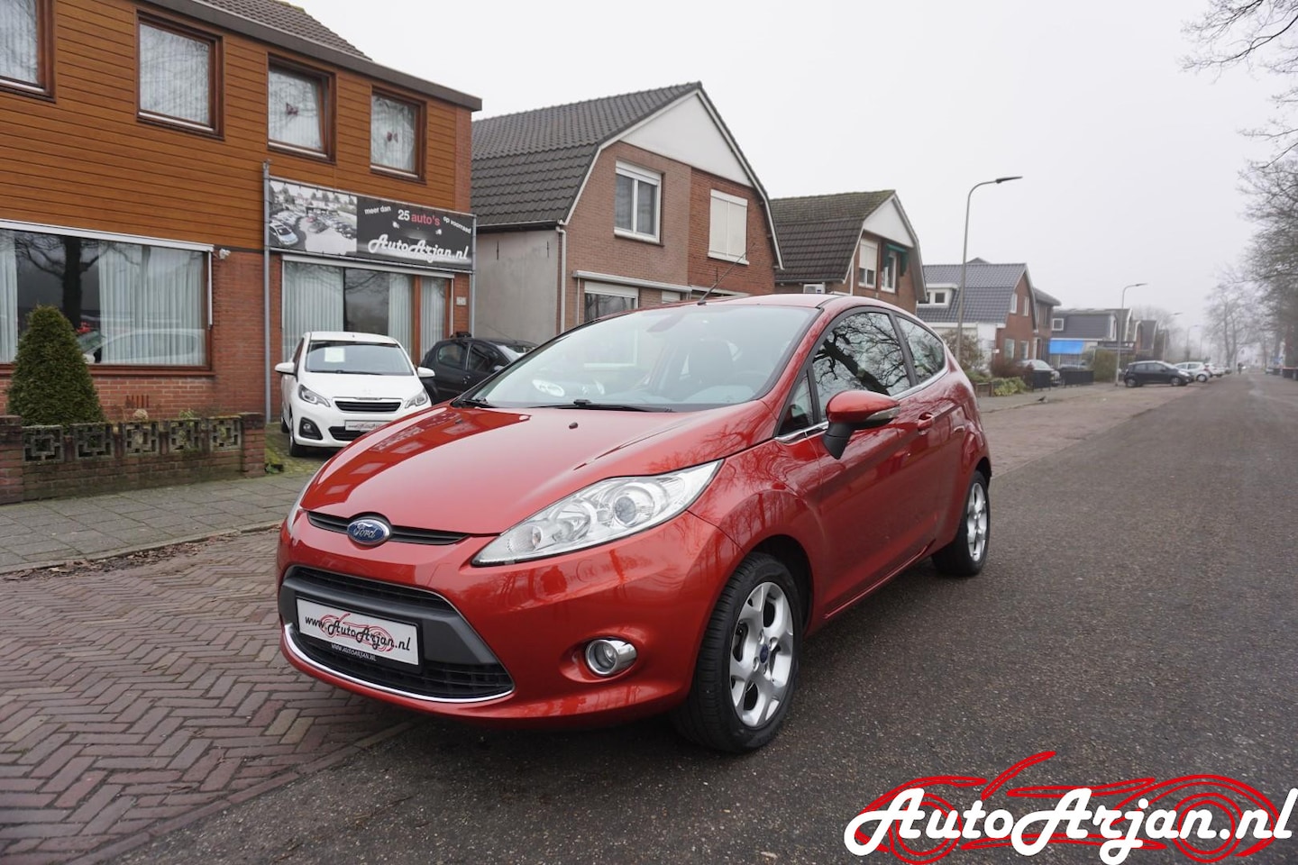 Ford Fiesta - 1.25 Ghia 1.25 Ghia - AutoWereld.nl