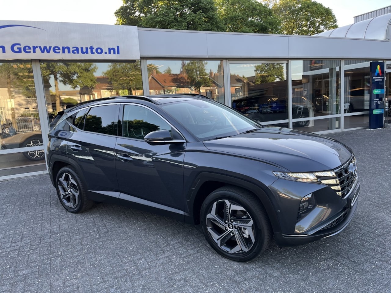 Hyundai Tucson - 1.6 T-GDI PHEV Premium Sky 4WD | Panorama dak | Camera | 1350kg - AutoWereld.nl