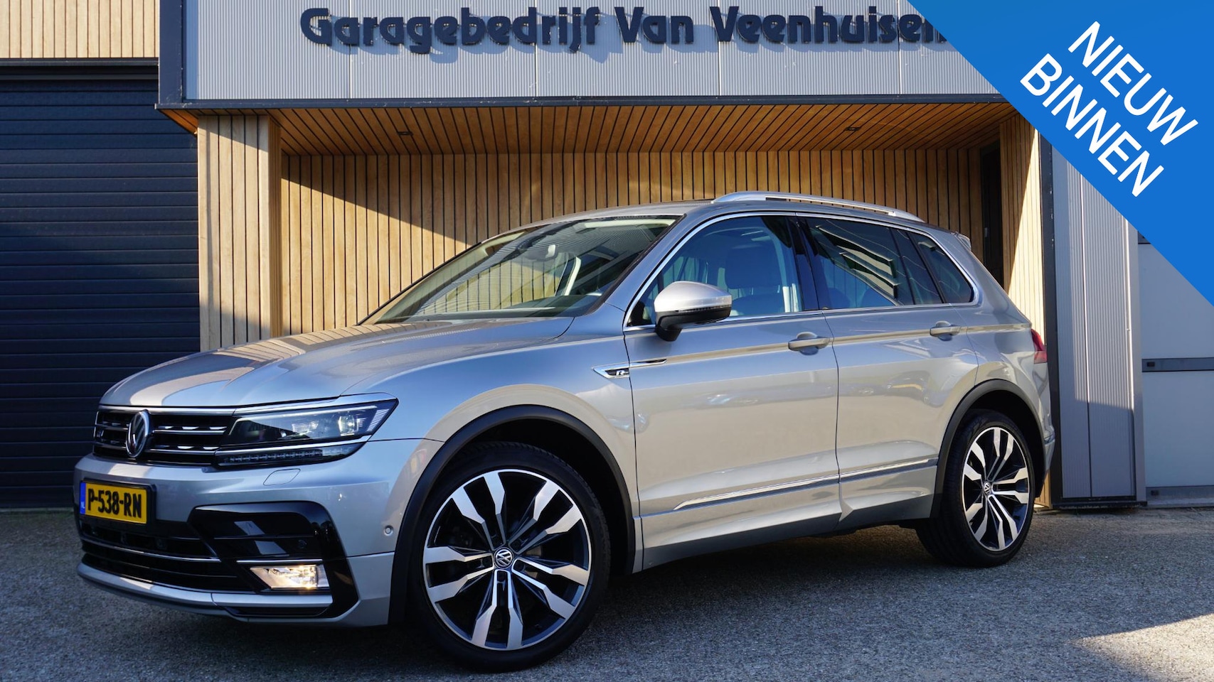 Volkswagen Tiguan - 1.4 TSI 150pk DSG R-Line & Highline Pano.Dak 360view Leder 20inch Suzuka Adaptive Cruise * - AutoWereld.nl