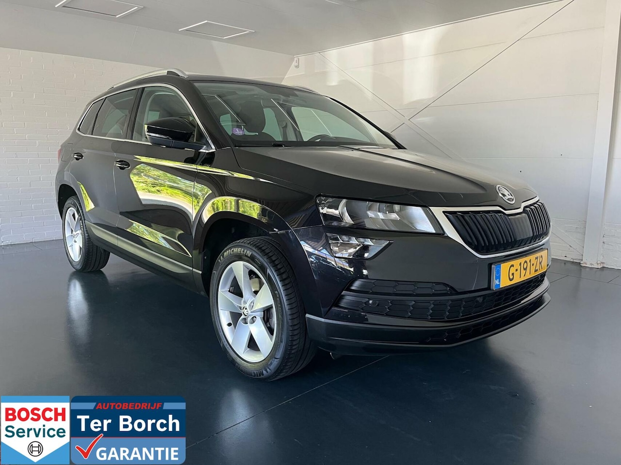 Skoda Karoq - 1.0 TSI Ambition Business 1.0 TSI Ambition Business,Pano-dak,T-haak,virtual dashbord - AutoWereld.nl