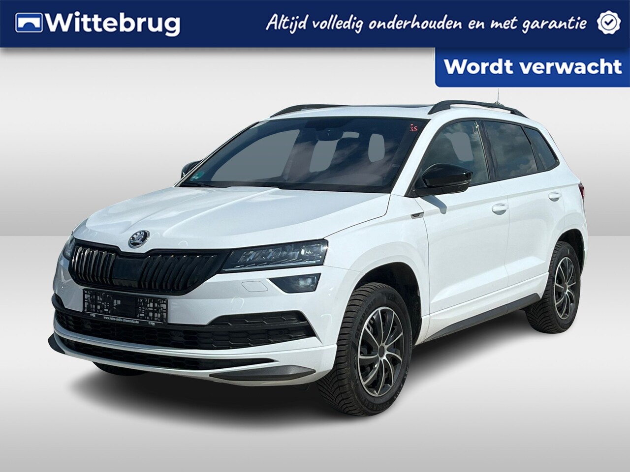 Skoda Karoq - 1.5 TSI ACT 150pk Sportline DSG Automaat / Panoramadak / LM 19 inch / Digital cockpit / Ca - AutoWereld.nl