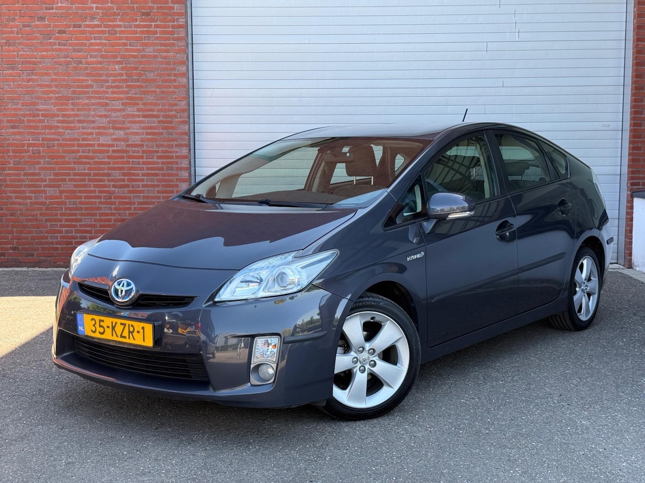 Toyota Prius - 1.8 Aspiration | NAVI | NEW APK | NAP | AIRCO - AutoWereld.nl