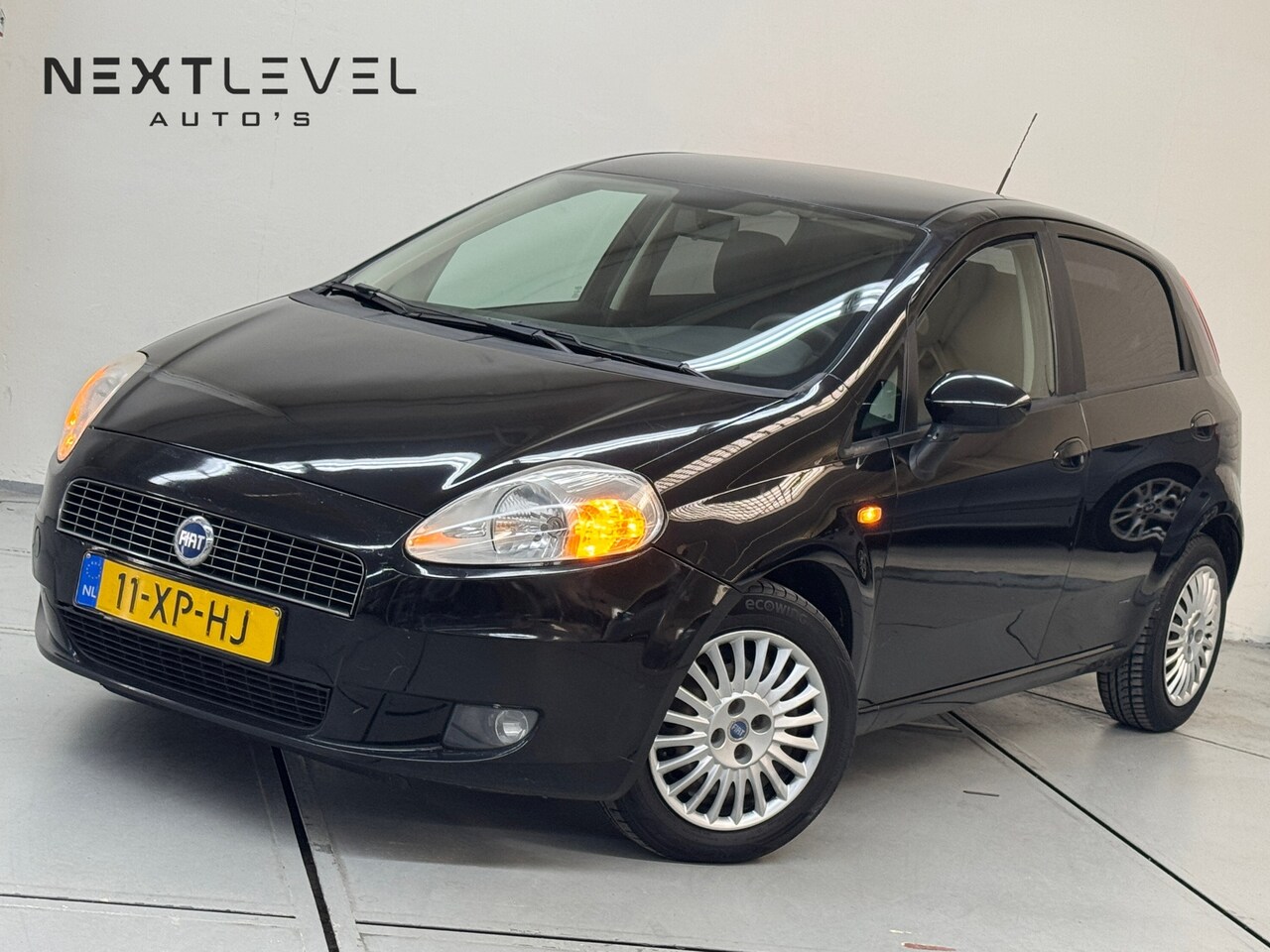 Fiat Grande Punto - 1.4 Dynamic Cruise Control Inruilkopje - AutoWereld.nl