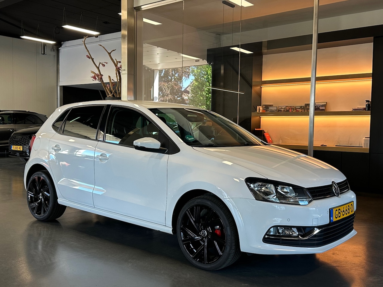 Volkswagen Polo - 1.2 TSI Highline NL auto Zeer netjes PDC - AutoWereld.nl