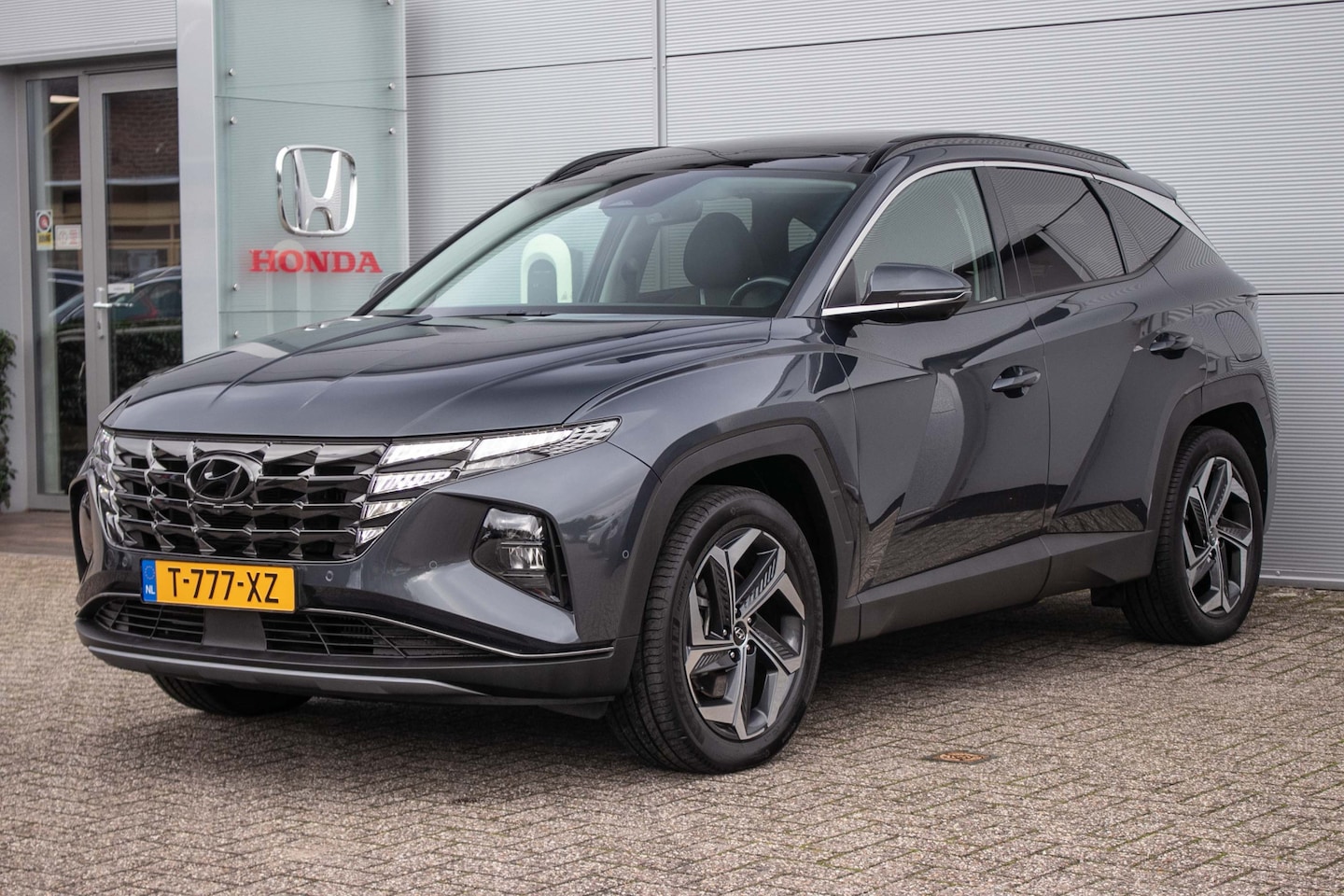 Hyundai Tucson - 1.6 T-GDI PHEV Premium Sky 4WD All-in rijklaar prijs | Zwart leder | Schuif/-kanteldak | S - AutoWereld.nl