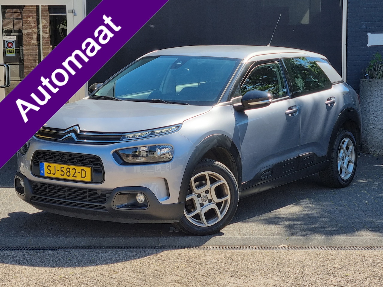 Citroën C4 Cactus - 1.2 PureTech Business CARPLAY / TREKHAAK / DAB / CLIMA / NAVI - AutoWereld.nl