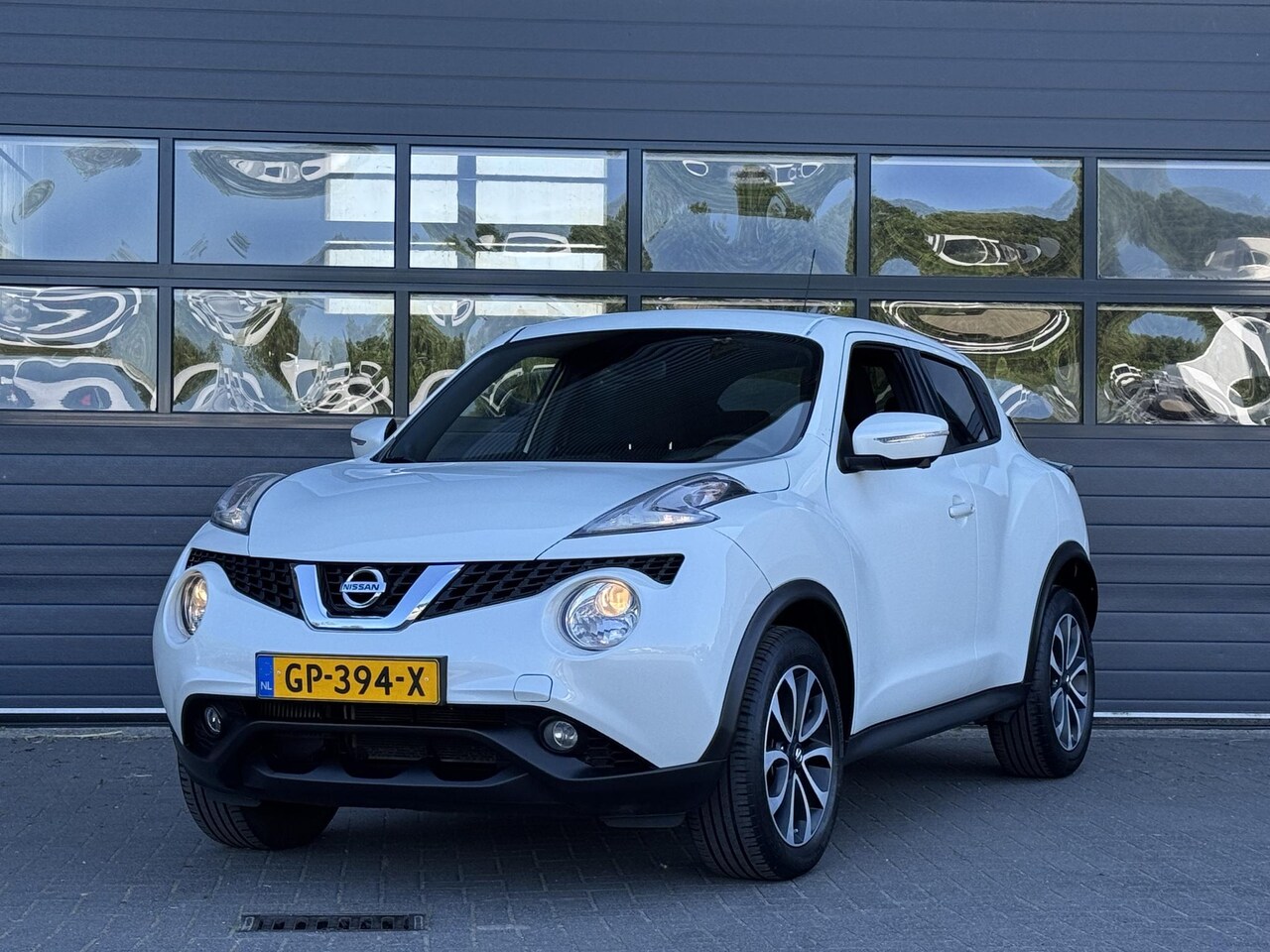 Nissan Juke - 1.2 DIG-T S/S CONNECT EDITION I CLIMATE CONTROL I NAVIGATIE I CAMERA I CRUISE CONTROL - AutoWereld.nl