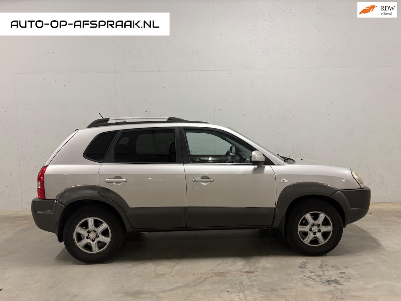 Hyundai Tucson - 2.0i Dynamic Airco Trekhaak Cruise - AutoWereld.nl