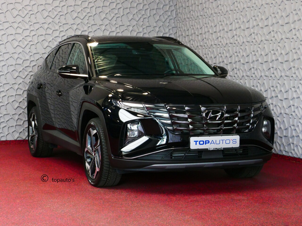 Hyundai Tucson - 1.6 T-GDI PHEV 265PK 19''LMV 4WD LED STUUR/STOEL VERW. NAVI ELEK.KLEP 08/2024 PHEV PLUG IN - AutoWereld.nl