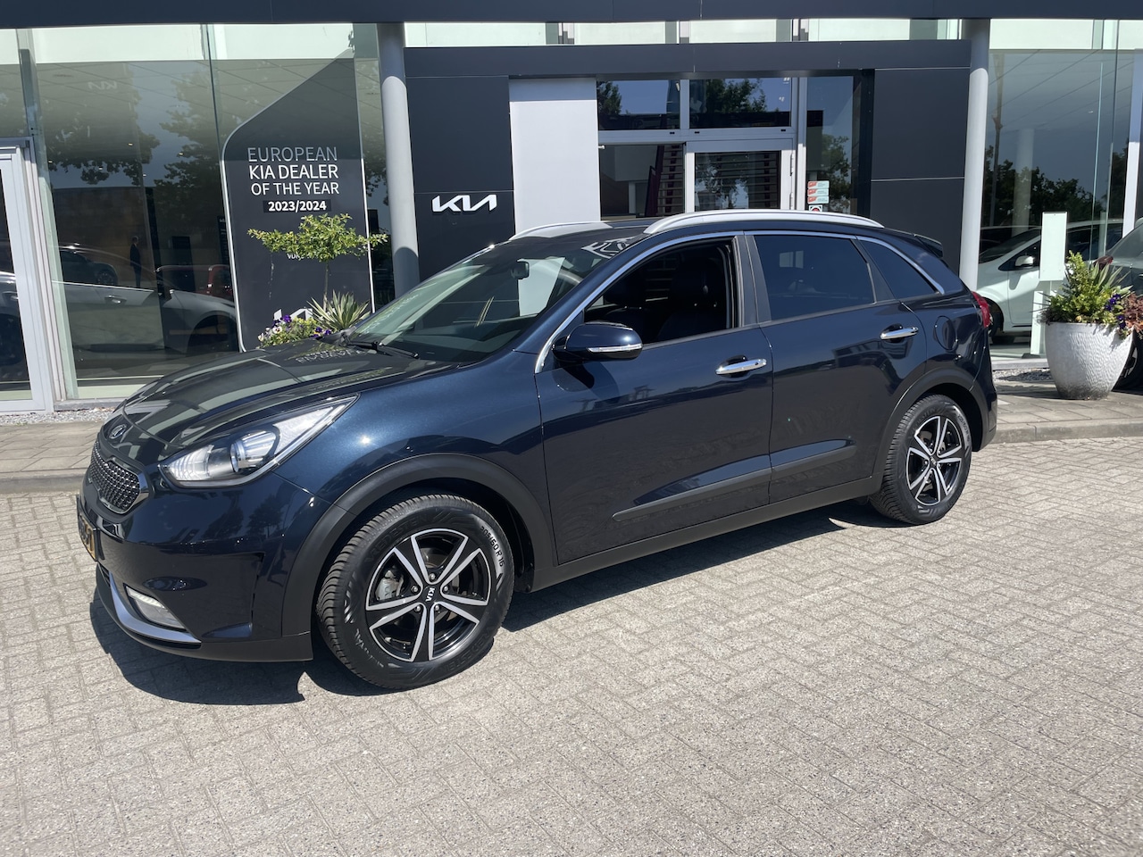 Kia Niro - 1.6 GDi Hybrid DynamicPlusLine Leder// Stoelverwarming // Trekhaak // Key-Less info Roel 0 - AutoWereld.nl