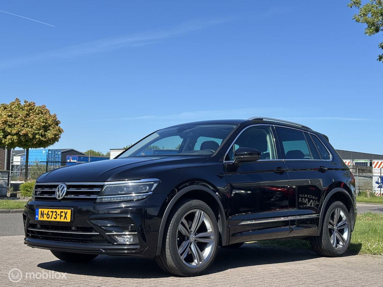 Volkswagen Tiguan - 1.4 4Motion Highline Business R trekhaak - AutoWereld.nl