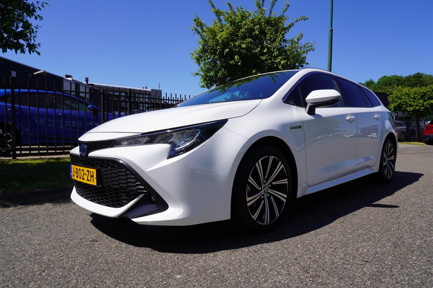 Toyota Corolla Touring Sports - 1.8 Hybrid 122pk CVT Business Plus Multi Media - AutoWereld.nl