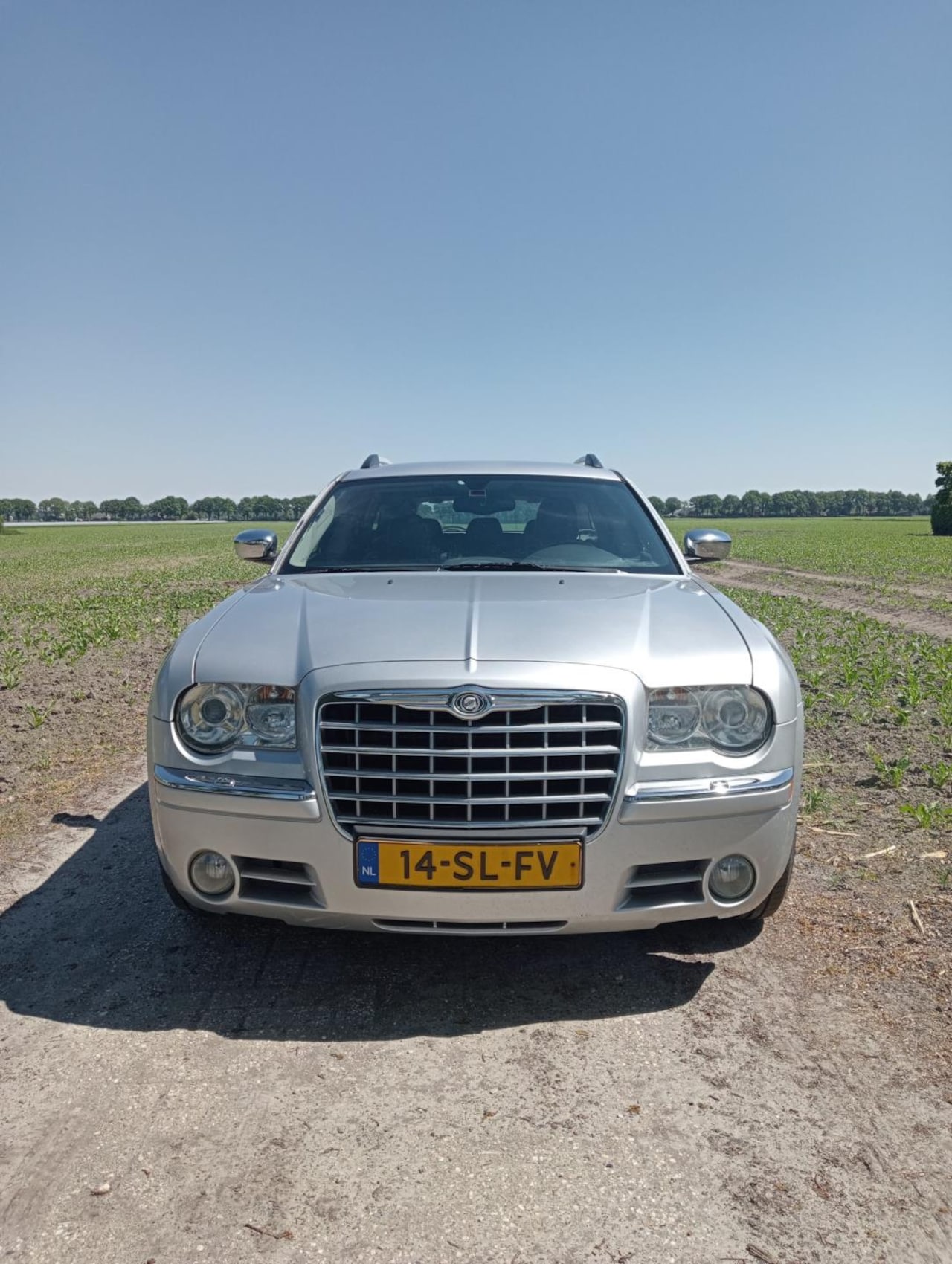 Chrysler 300C Touring - 5.7 V8 HEMI AWD 5.7 V8 HEMI AWD - AutoWereld.nl