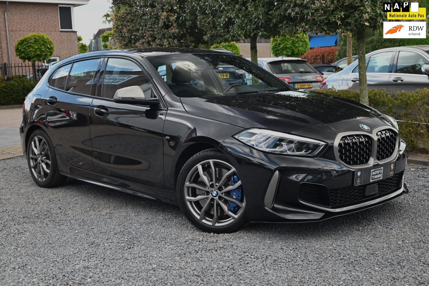 BMW 1-serie - M135i xDrive High Executive 306 PK Dealer o.h. Adaptive Head Up Camera Keyless 19'' - AutoWereld.nl