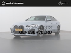 BMW i4 - eDrive40 84 kWh M-Sport | SOH 99% | Schuif/Kanteldak | Trekhaak Ele.wegklapbaar | Sportsto