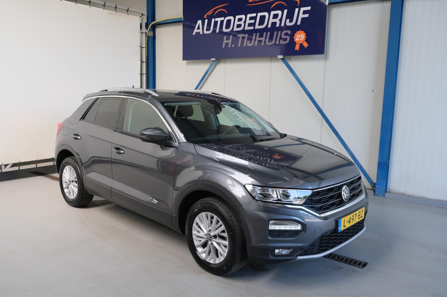Volkswagen T-Roc - 1.0 TSI Style - N.A.P. Airco, Cruise, Navi, PDC, Camera. - AutoWereld.nl