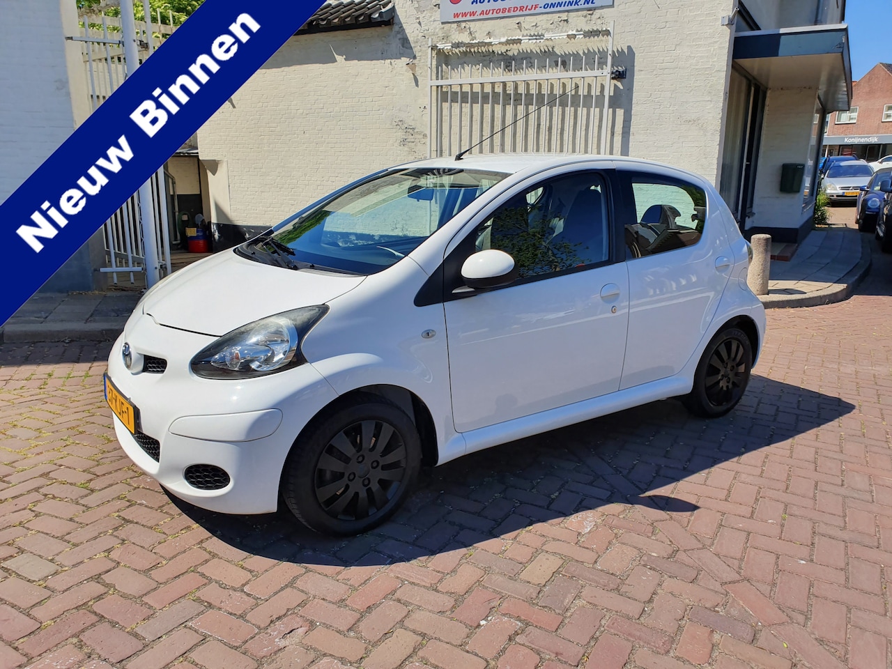 Toyota Aygo - 1.0-12V Xcite White *Half leder / Airco* - AutoWereld.nl