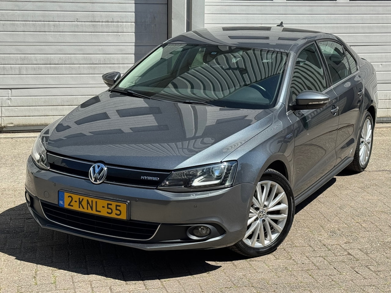 Volkswagen Jetta - 1.4 TSI Hybrid Highline xenon/led/aut/navi/parkeersensoren - AutoWereld.nl