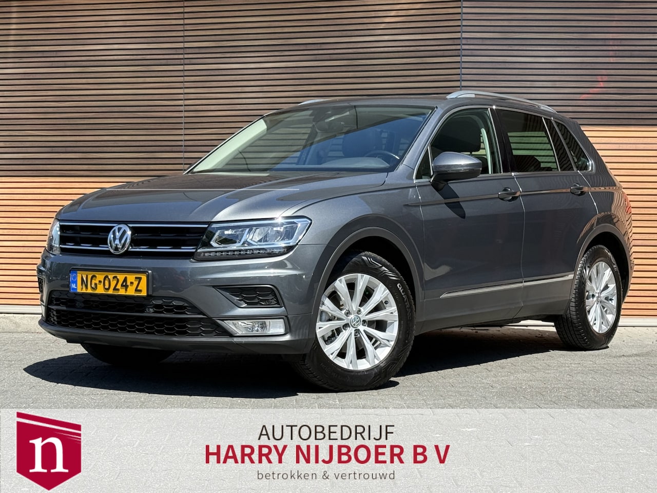 Volkswagen Tiguan - 1.4 TSI Comfortline Panodak / Navi / Trekhaak / Dynaudio / Clima - AutoWereld.nl
