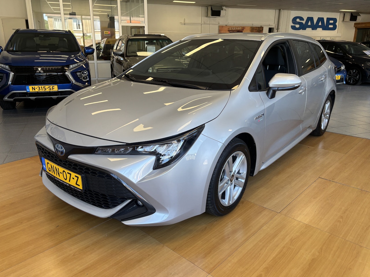Toyota Corolla Touring Sports - 1.8 Hybrid CARPLAY - NAVI - CAMERA - - AutoWereld.nl