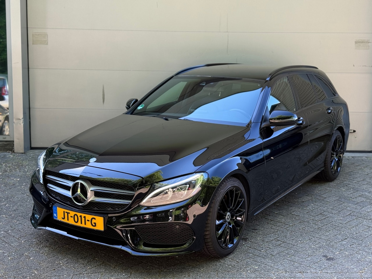 Mercedes-Benz C-klasse Estate - 200 Prestige AMG l Volleder l Climate l Navi l Xenon l Volledig Onderhouden l - AutoWereld.nl
