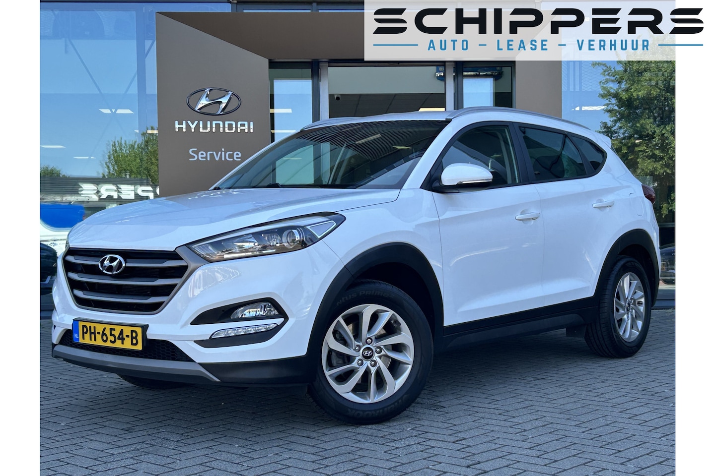 Hyundai Tucson - 1.6 GDi Anniversary Edition | Trekhaak | Navigatie | Lichtmetalen velgen 17'' | Stoelverwa - AutoWereld.nl
