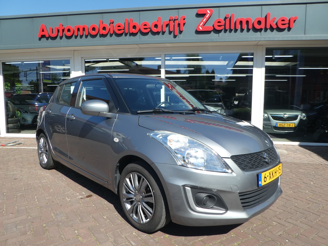 Suzuki Swift - 1.2 Comfort EASSS Airco, Stoelverw, trekhaak, 16 "Lm velgen - AutoWereld.nl
