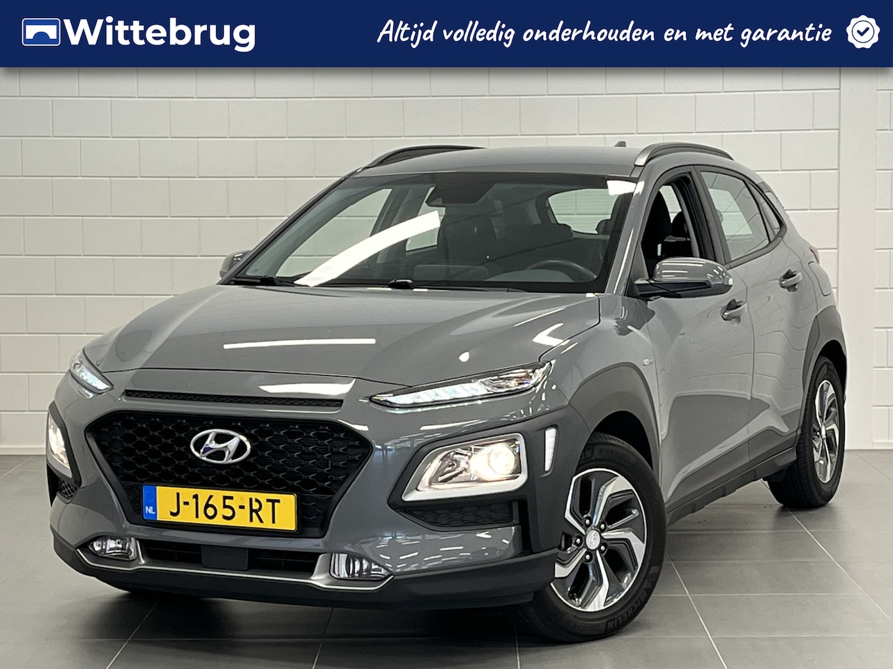 Hyundai Kona - 1.6 GDI HEV Comfort Smart NAVIGATIE | PARKEERCAMERA | ZUINIGE HYBRIDE MET HOGE INSTAP - AutoWereld.nl