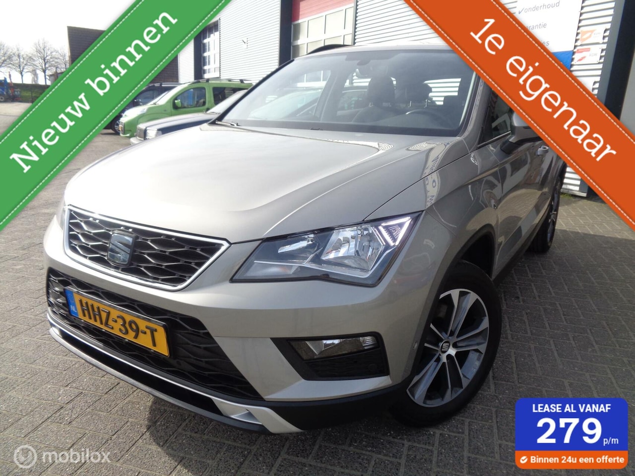 Seat Ateca - 1.0 EcoTSI Style/Airco/ECC/Lm velgen/1st eig/Trekhaak - AutoWereld.nl