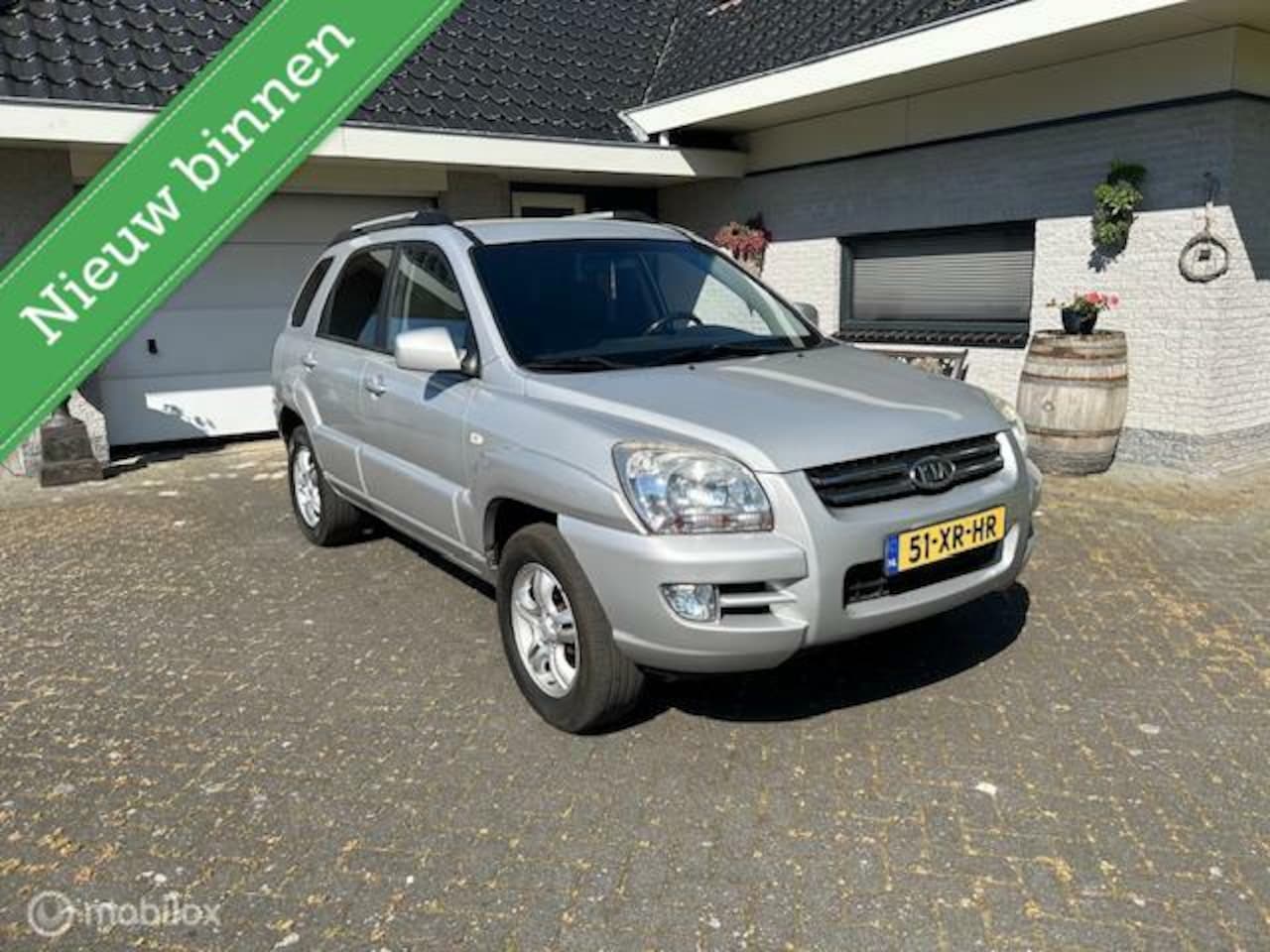 Kia Sportage - 2.0 CVVT X-pression Airco Cruise Nieuwe APK! - AutoWereld.nl
