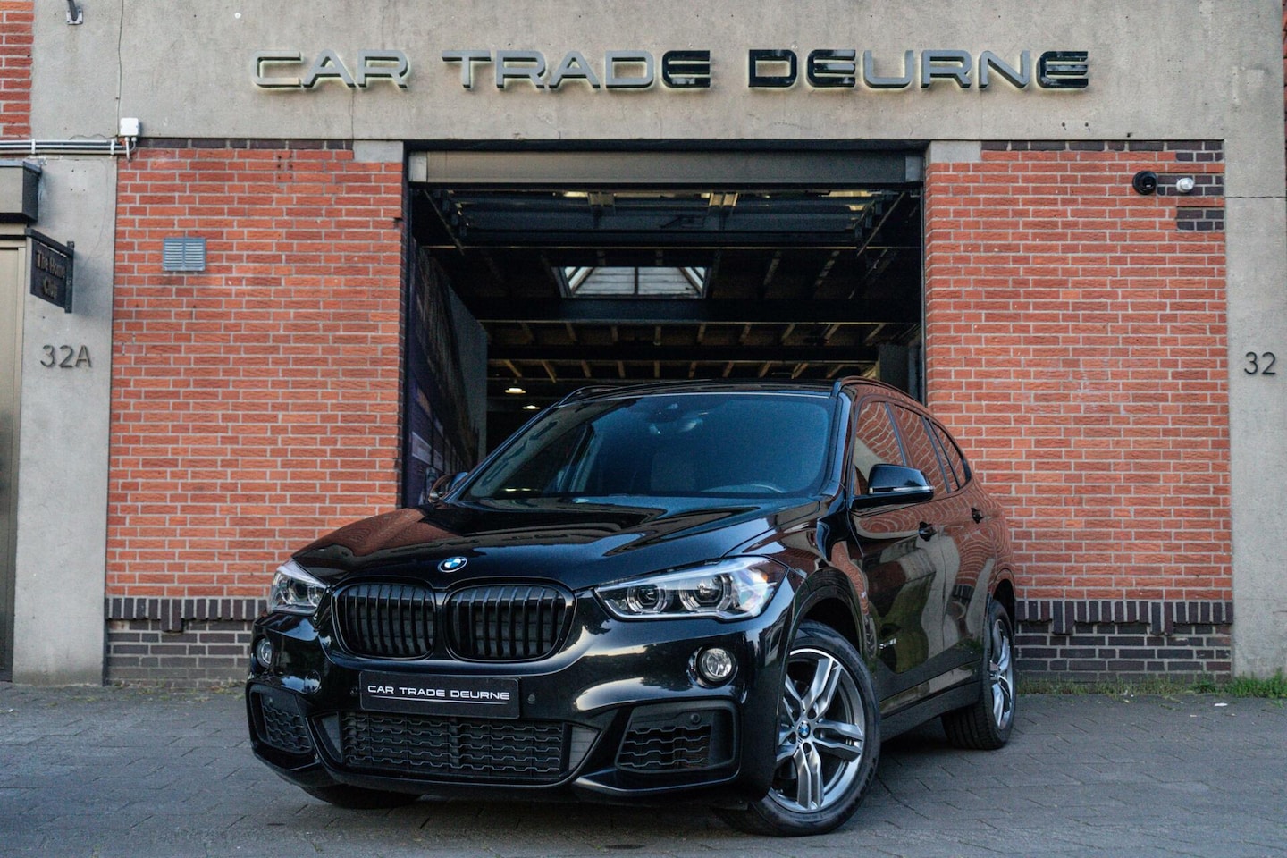 BMW X1 - sDrive18i High Executive M-Sport Navi / Cruise / PDC - AutoWereld.nl