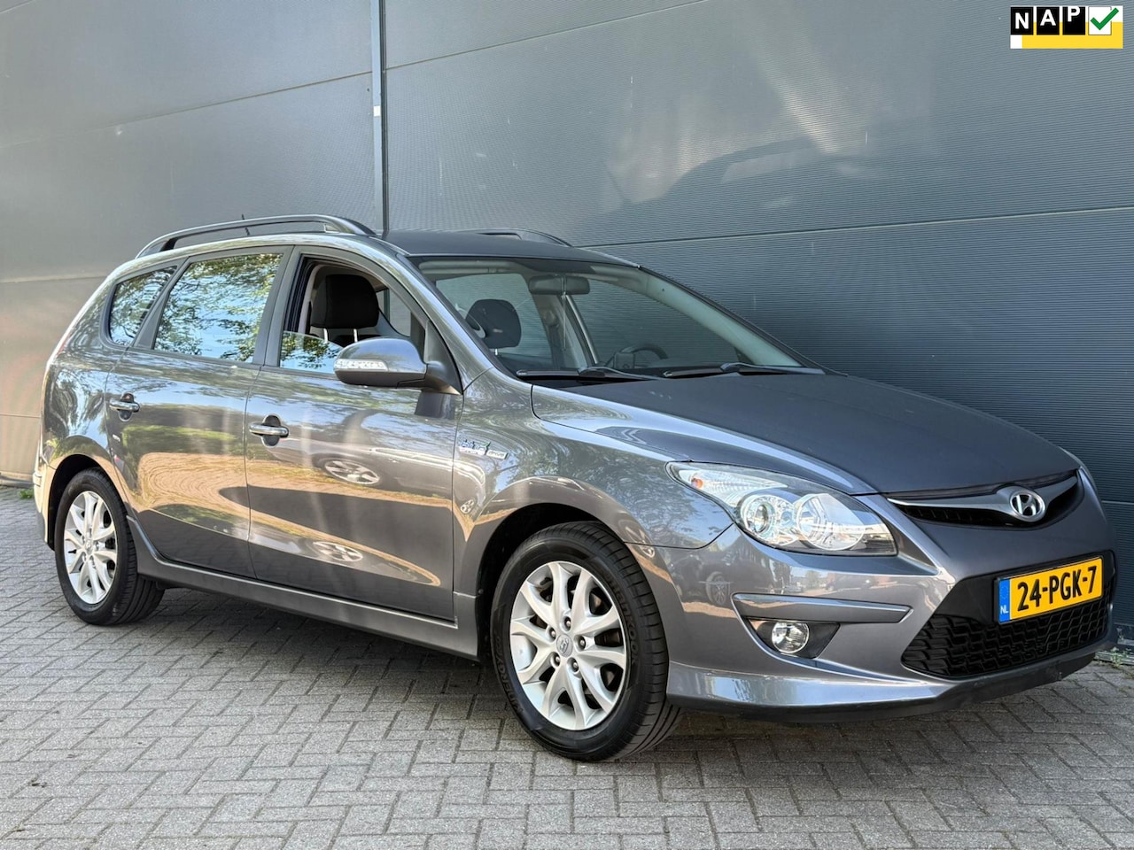Hyundai i30 CW - 1.6i i-Motion AIRCO | ELEK RAMEN | CRUISE | PDC | NWE APK - AutoWereld.nl