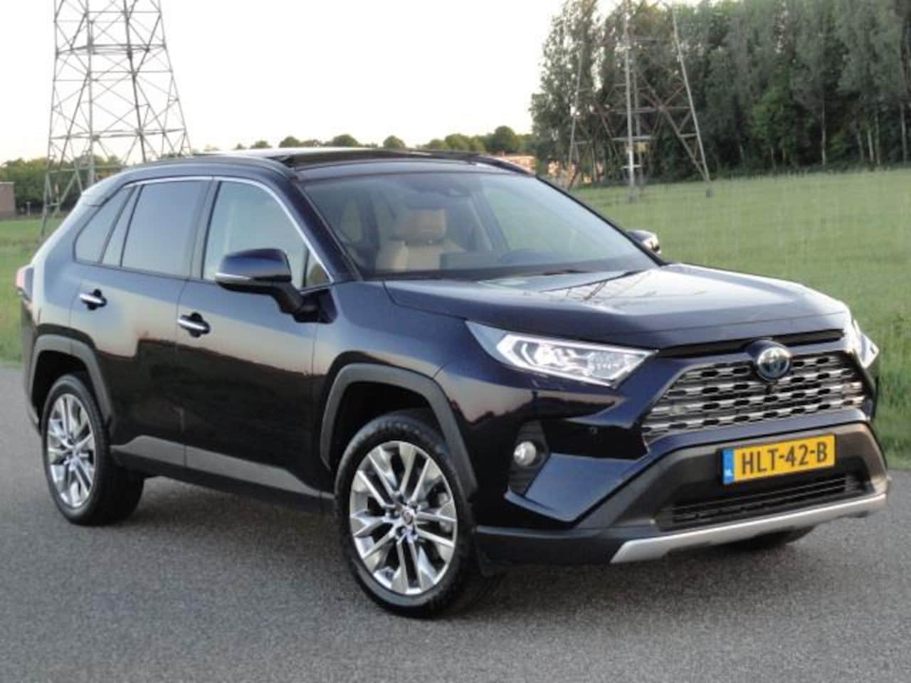 Toyota RAV4 - 2.5Hybrid AWD Bi-Tone Full LED-PANO-NAVIG-CAMERA-TREKHAAK - AutoWereld.nl