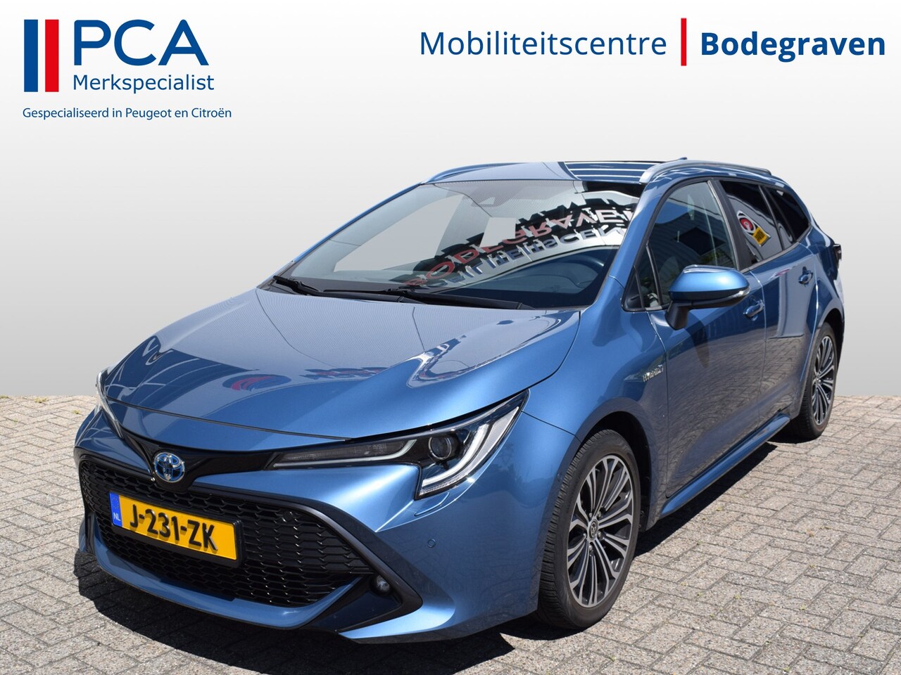 Toyota Corolla Touring Sports - 1.8 Hybrid Business | Trekhaak | Adaptive Cruise Control | Camera - AutoWereld.nl