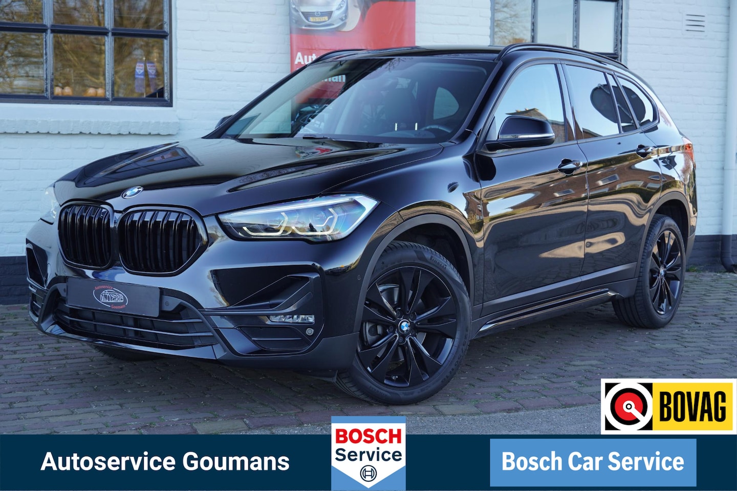 BMW X1 - sDrive18i Executive Edition Sport line Elek klep Navi LED Shadow Black - AutoWereld.nl
