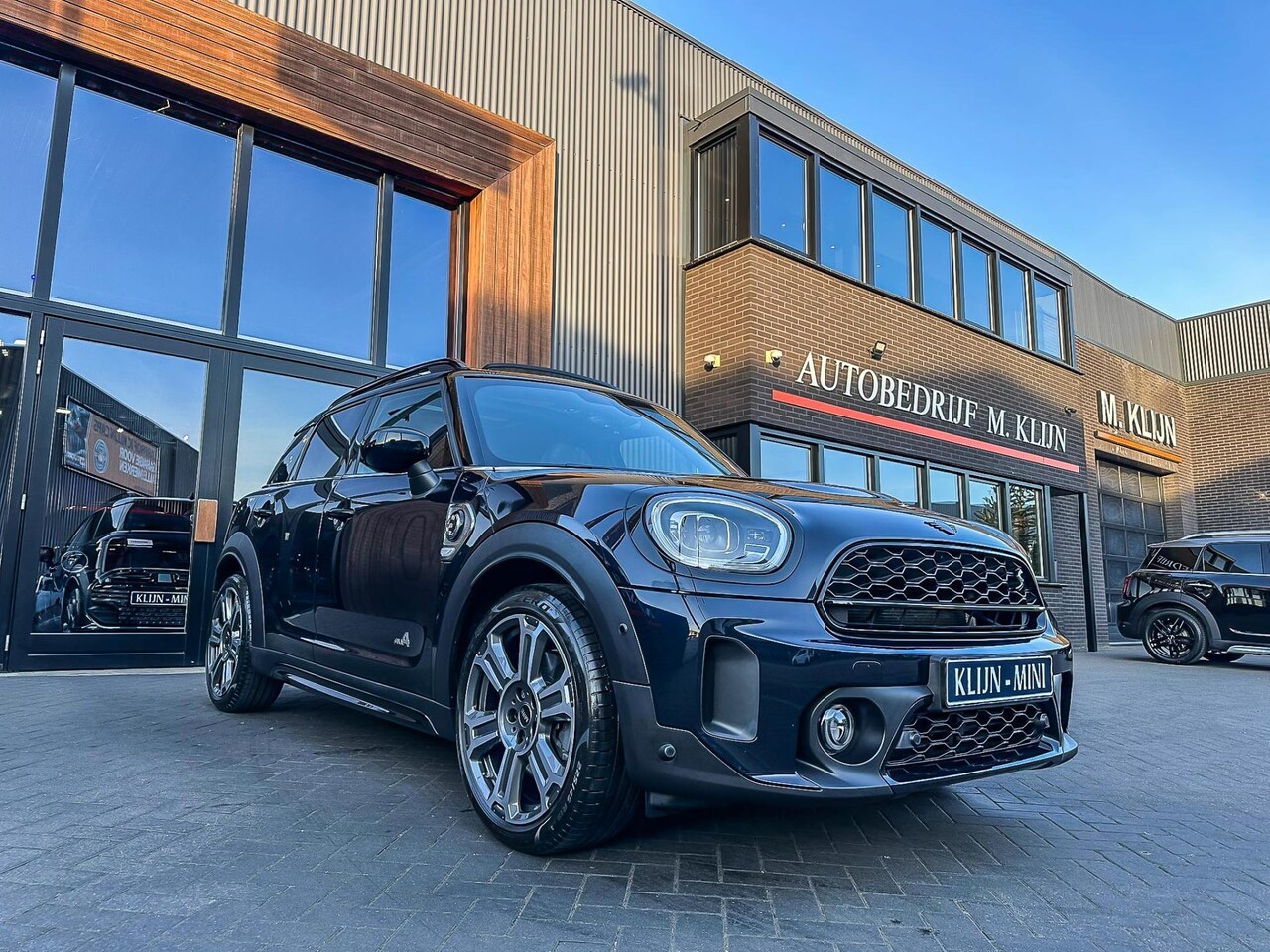 MINI Countryman - Mini 2.0 Cooper S E ALL4 MINI Yours 220pk/Pano/Hk/Head Up/19"/Btw/Bomvol - AutoWereld.nl