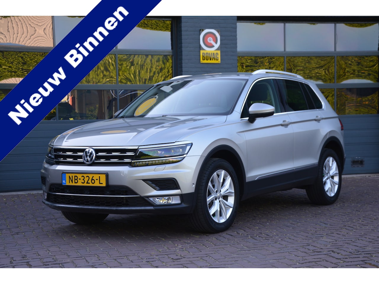 Volkswagen Tiguan - 2.0 TSI 4Motion Highline 2.0 TSI 4Motion Highline - AutoWereld.nl