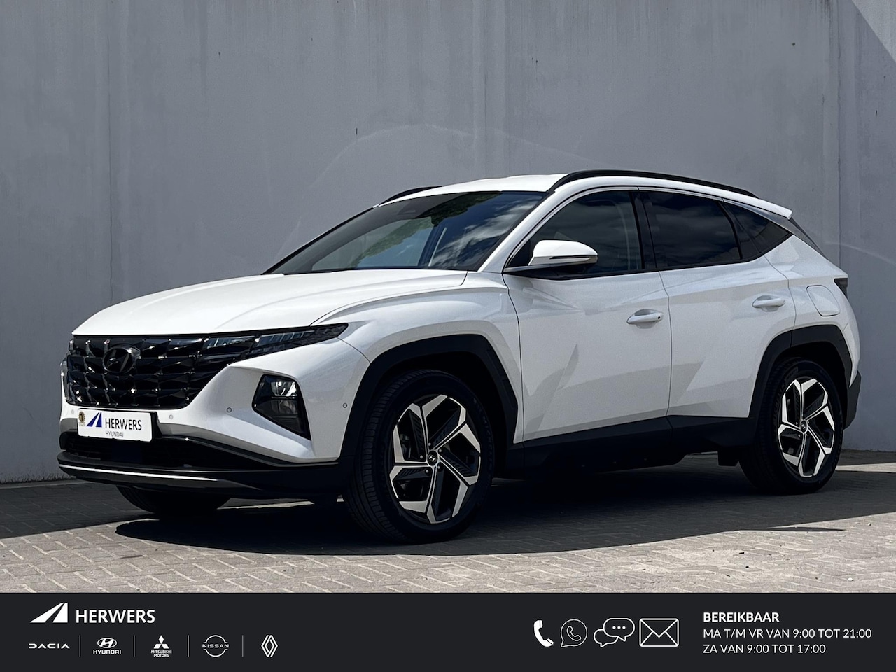 Hyundai Tucson - 1.6 T-GDI PHEV Premium 4WD 265pk automaat / Weinig km / Dealer onderhouden / Accu SoH 100% - AutoWereld.nl