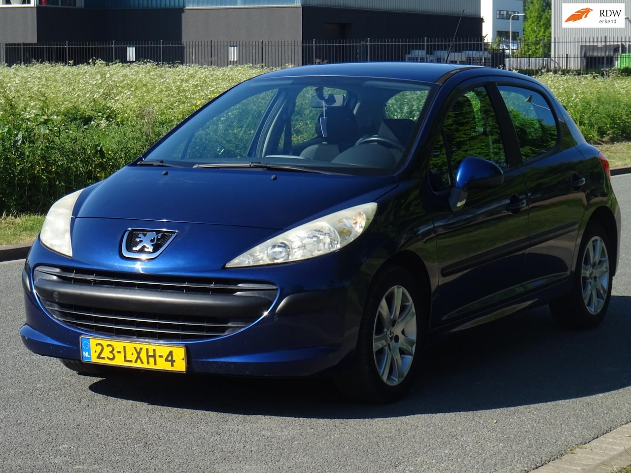 Peugeot 207 - 1.4 VTi XR BJ2009 5DEURS AIRCO/CRUISE/APK 2026 - AutoWereld.nl
