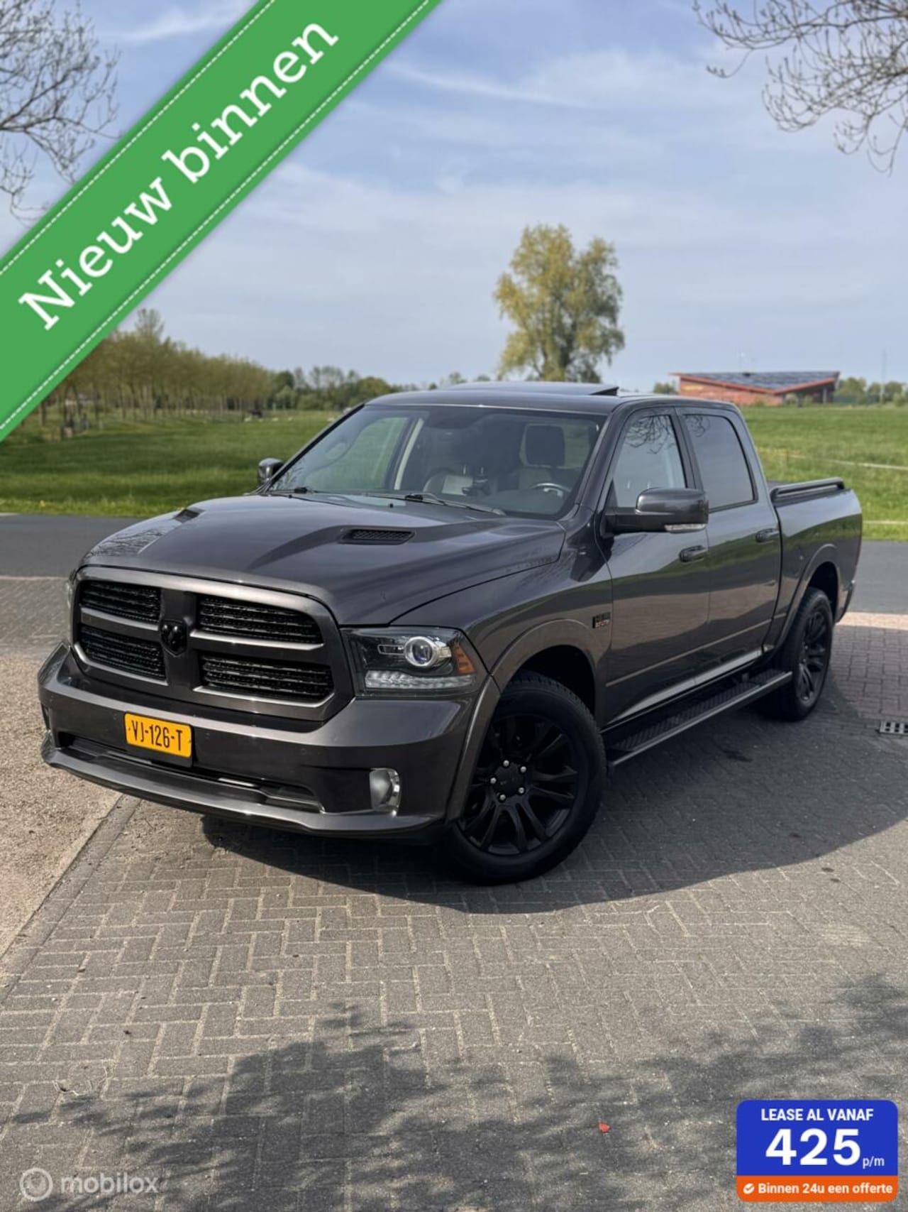 Dodge Ram 1500 - 4X4 5.7 V8 4x4 Quad Cab 6'4 Sport - AutoWereld.nl