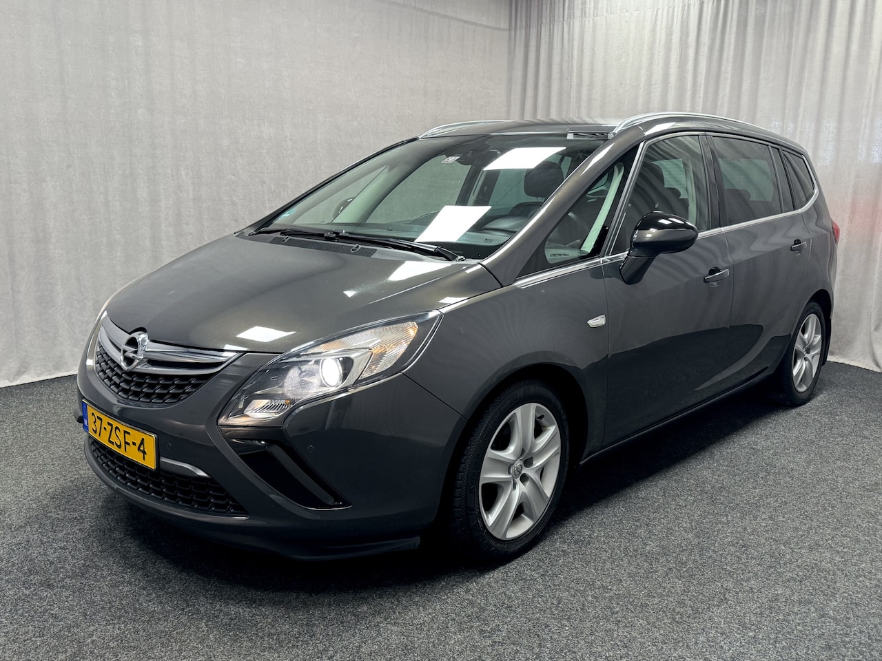 Opel Zafira Tourer - 1.4 Cosmo | Navi | Xenon | Cruise | Trekhaak | - AutoWereld.nl