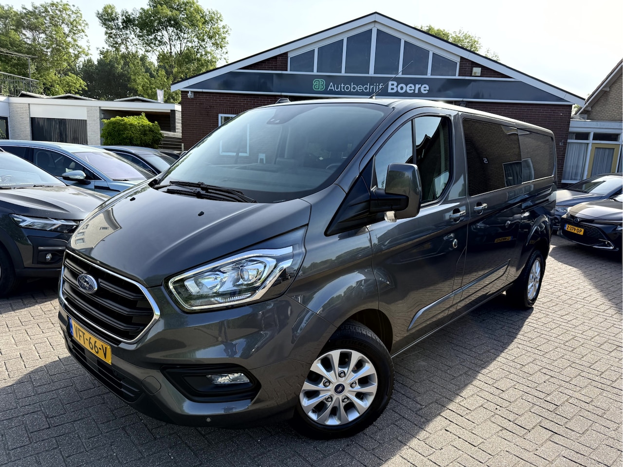 Ford Transit Custom - 2.0 TDCI 130pk L2 Dubbel Cabine Limited 53069km, Camera, Trekhaak - AutoWereld.nl