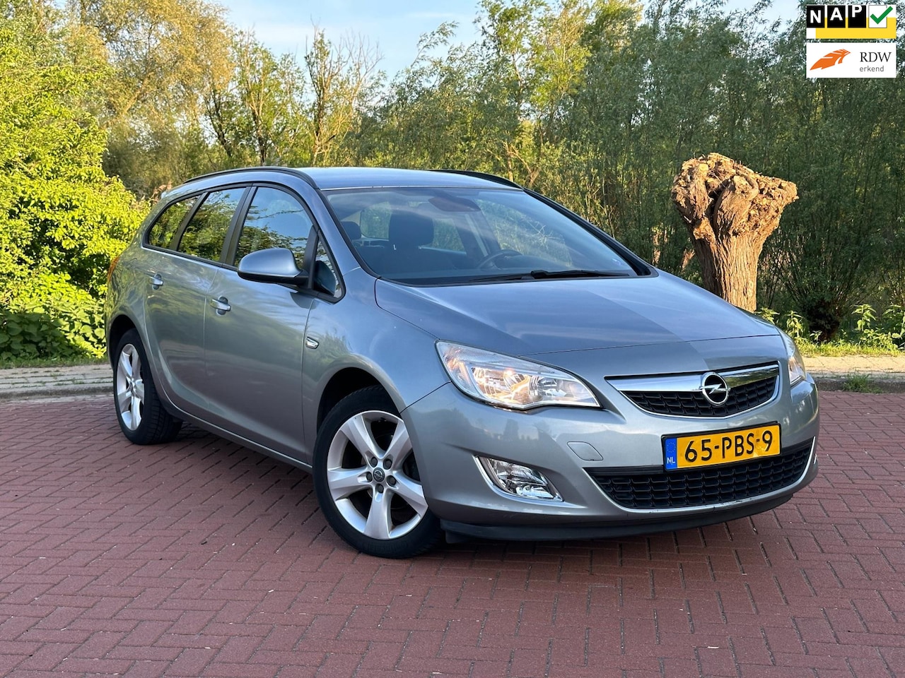 Opel Astra Sports Tourer - 1.4 Turbo Edition Nap/Airco - AutoWereld.nl