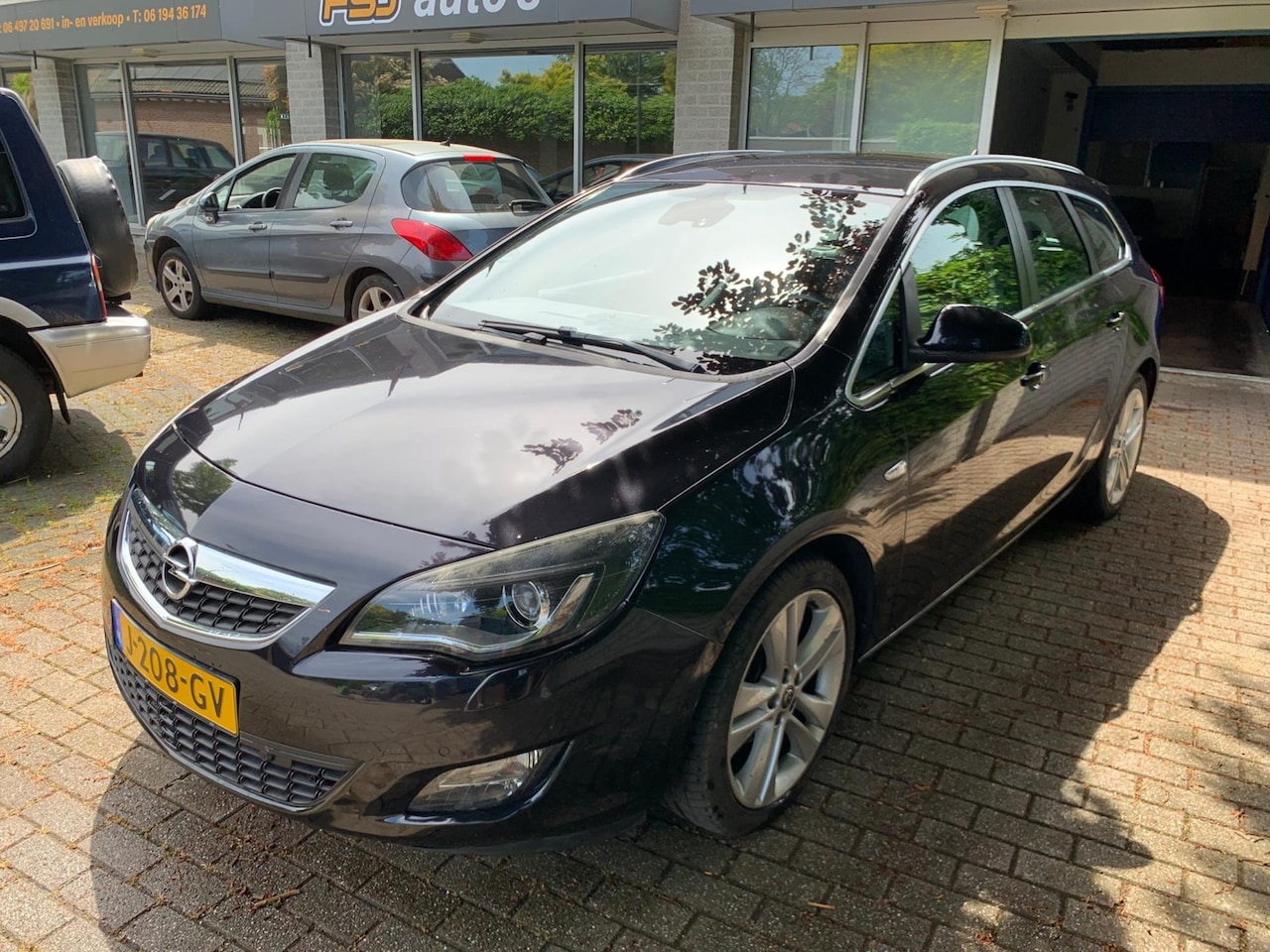 Opel Astra Sports Tourer - 1.6 / AUTOMAAT / LEES TEKST !! - AutoWereld.nl
