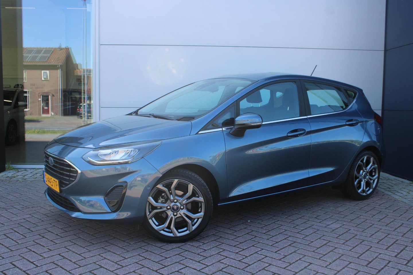 Ford Fiesta - 1.0 EcoBoost Hybrid 125pk Titanium Airco Stoelverwarming Camera Carplay - AutoWereld.nl