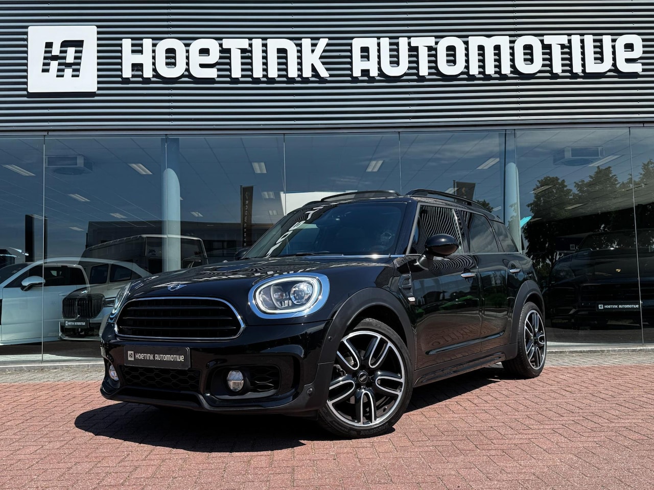 MINI Countryman - Mini 1.5 Cooper Chili | JCW pakket | Pano | LED | Camera | Trekhaak - AutoWereld.nl